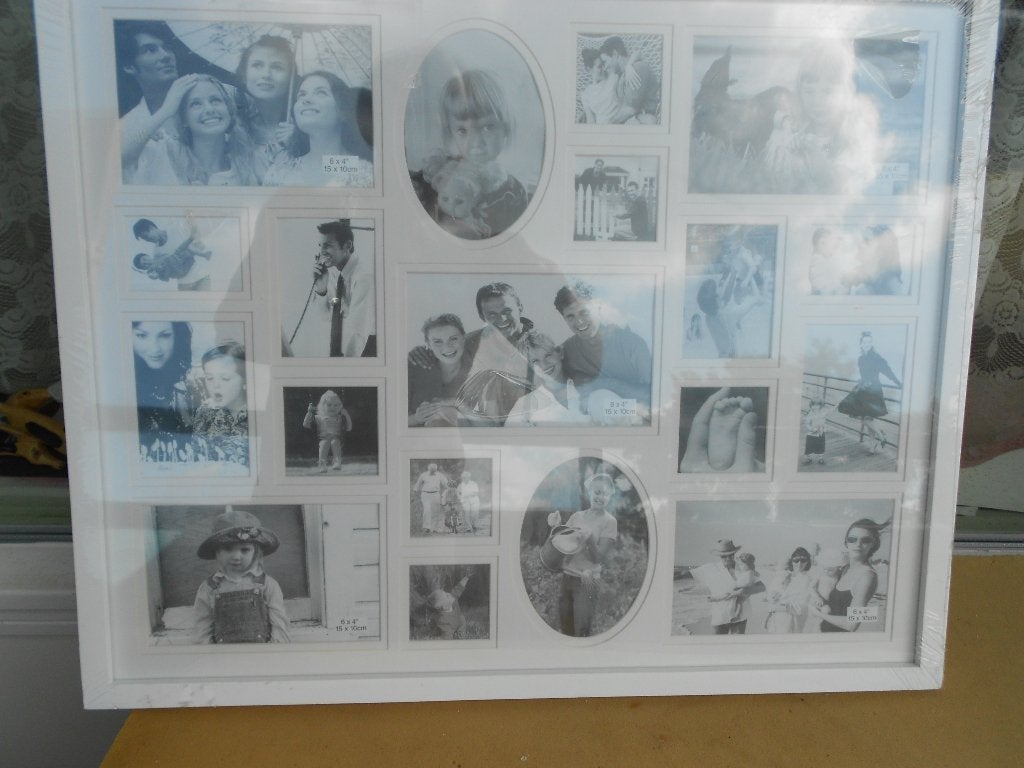 Multi fotolijst voor 19 foto s in diverse formaten. Ca.43X53, Audio, Tv en Foto, Fotografie | Fotolijsten, Ophalen, Gebruikt, Collagefotolijst
