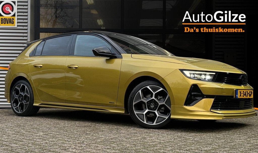 Opel Astra 1.2T Ultimate Irmscher l Pano l Stoelverwarming l, Auto's, Opel, Gebruikt, 1199 cc, Alcantara, Geel