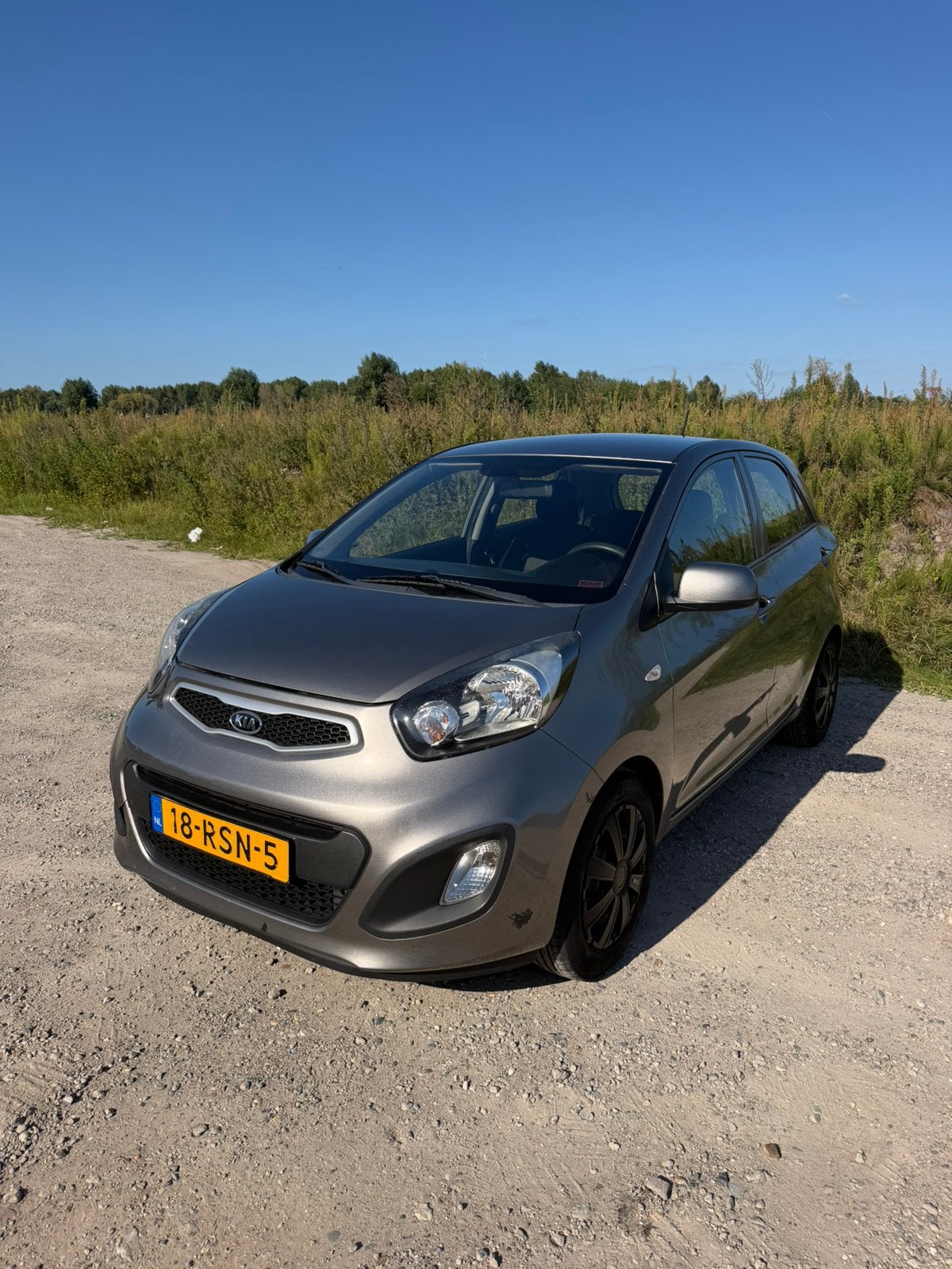Kia Picanto 1.0 Cvvt 5-DRS 2011 Grijs, Auto's, Voorwielaandrijving, 400 kg, Origineel Nederlands, 24 km/l