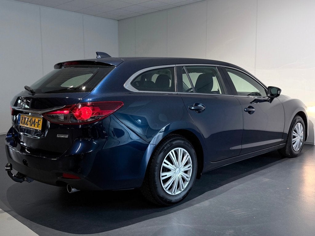 Mazda 6 Sportbreak 2.0 TS /Clima/Cruise/Stoelverw/Trekhaak/K, Auto's, Mazda, Stof, Gebruikt, 680 kg, Handgeschakeld