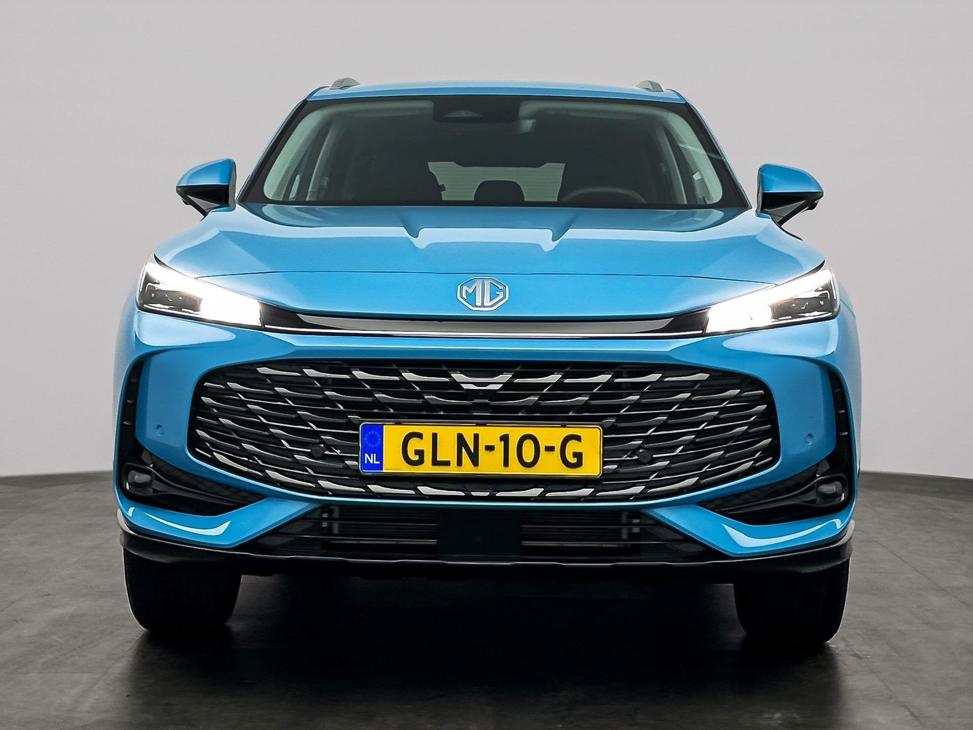 MG HS PHEV 1.5 272pk Aut. Luxury | 100km Electrisch | Navi |, Auto's, MG, 12 maanden, Stof, 4 cilinders, Blauw