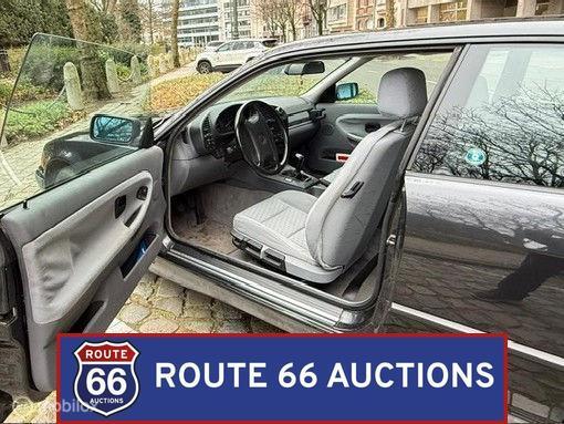 BMW 320i Coupe | 1994 | Route 66 Auctions, Auto's, Oldtimers, Overige carrosserieën, Zwart, Bedrijf, Handgeschakeld