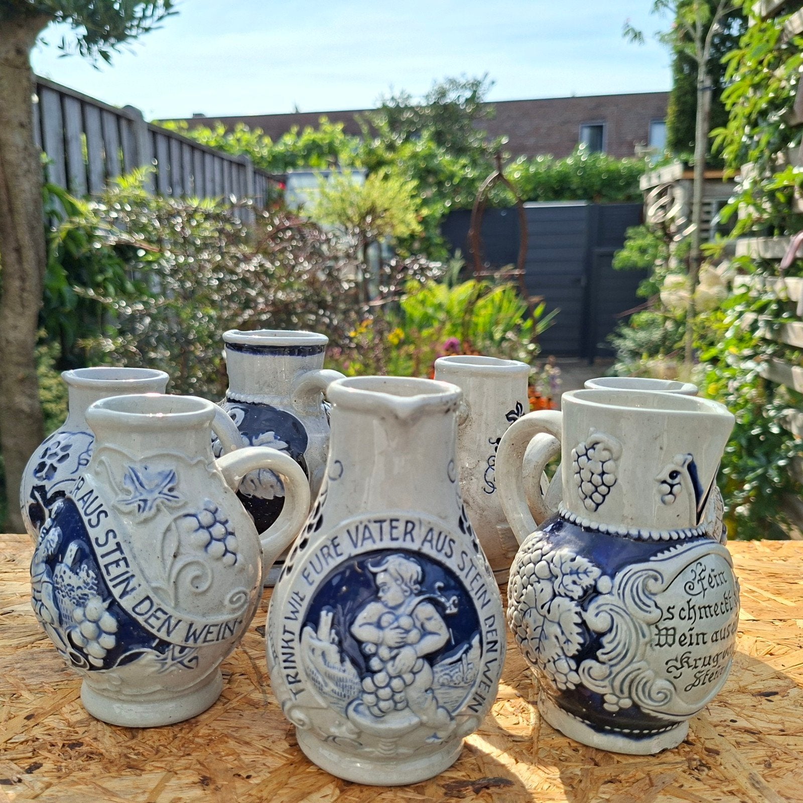Set van 7 Vintage Duitse Stoneware Wijnkannen/Kruiken, Antiek en Kunst, Verzenden