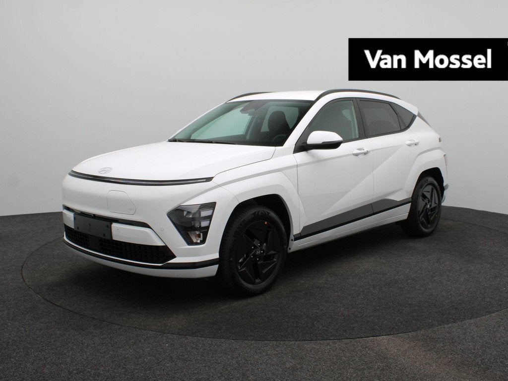 Hyundai Kona Electric Long Range Pure Edition 64.8 kWh | Sto, Auto's, Hyundai, Stof, Zwart, Met garantie (alle), Automatische klimaatregeling