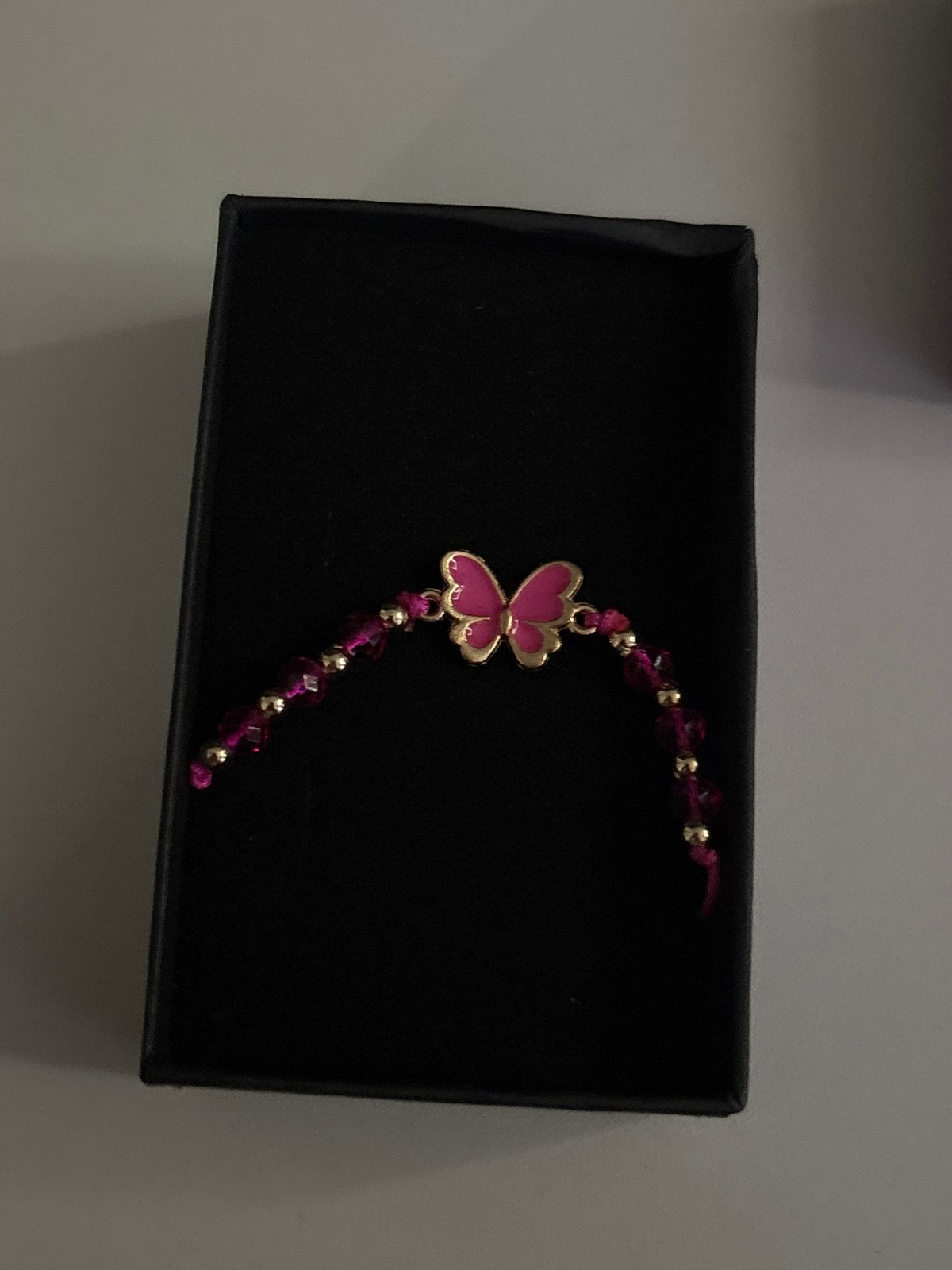 Vlinder Armband Roze - Nieuw, Sieraden, Tassen en Uiterlijk, Armbanden, Overige materialen, Nieuw, Ophalen of Verzenden, Roze