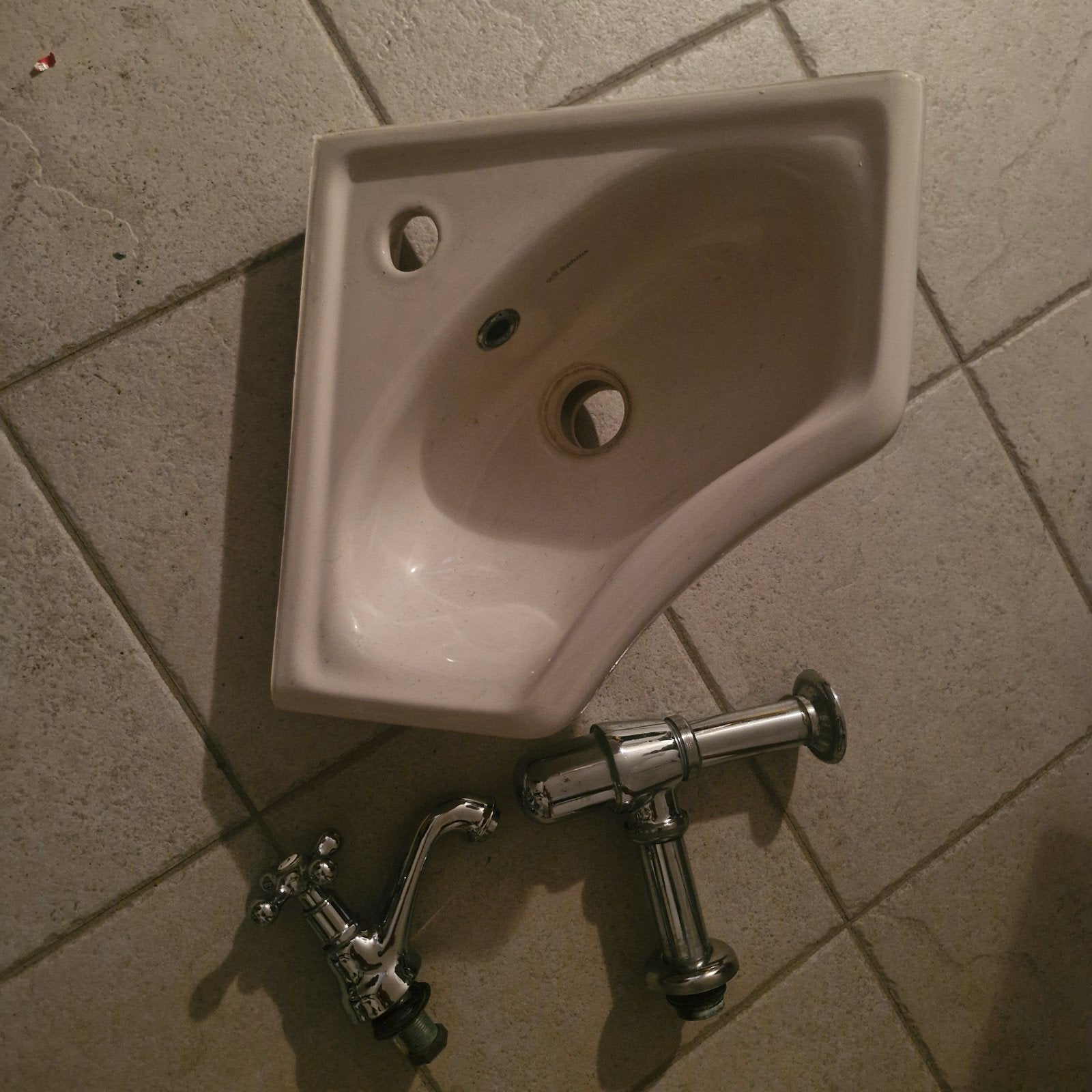 Hoekfontein met kraan, Ophalen