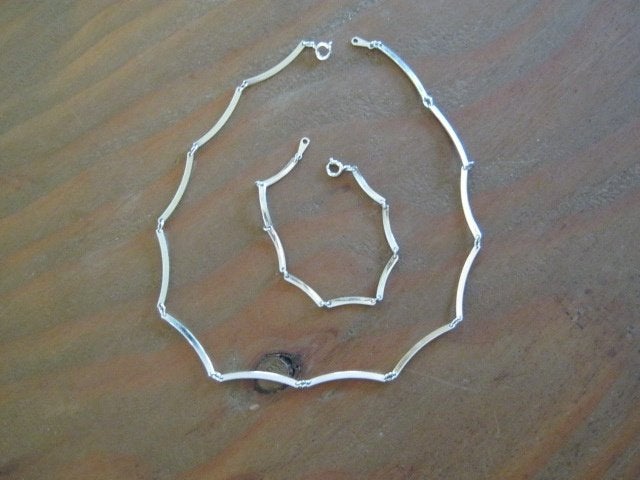 Ketting en Armband   small van Avon  zie foto nr 1362, Verzenden, Zo goed als nieuw, Zilver, Overige materialen
