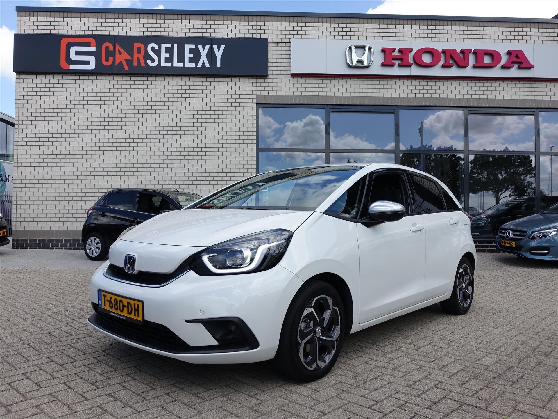 HONDA Jazz 1.5 i-MMD 109pk Hybrid CVT Executive Trekhaak, Auto's, Stof, Wit, 98 pk, Bedrijf