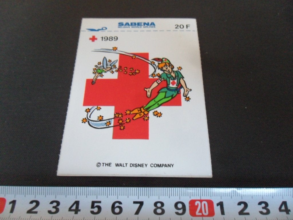 sticker Rode Kruis 1989 Strip Peter Pan Walt Disney SABENA, Ophalen of Verzenden, Zo goed als nieuw