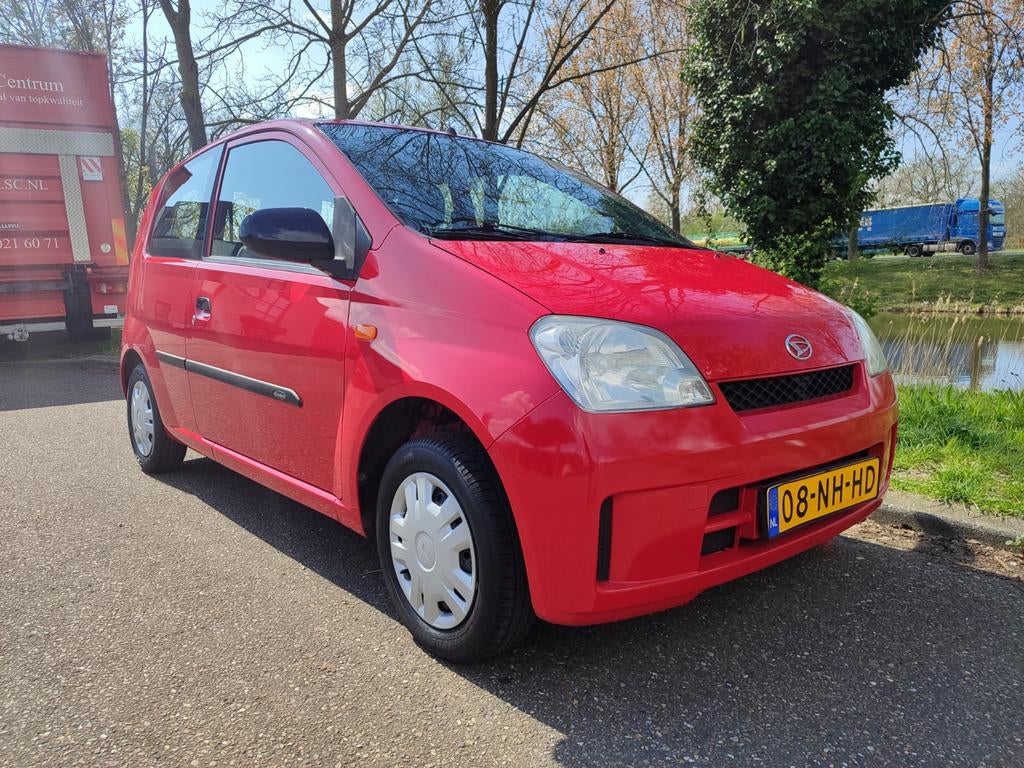 Daihatsu Cuore 1.0 3D 2003 Rood zeer weinig kilometers!!, Stof, 600 kg, 18 €/maand, Cuore