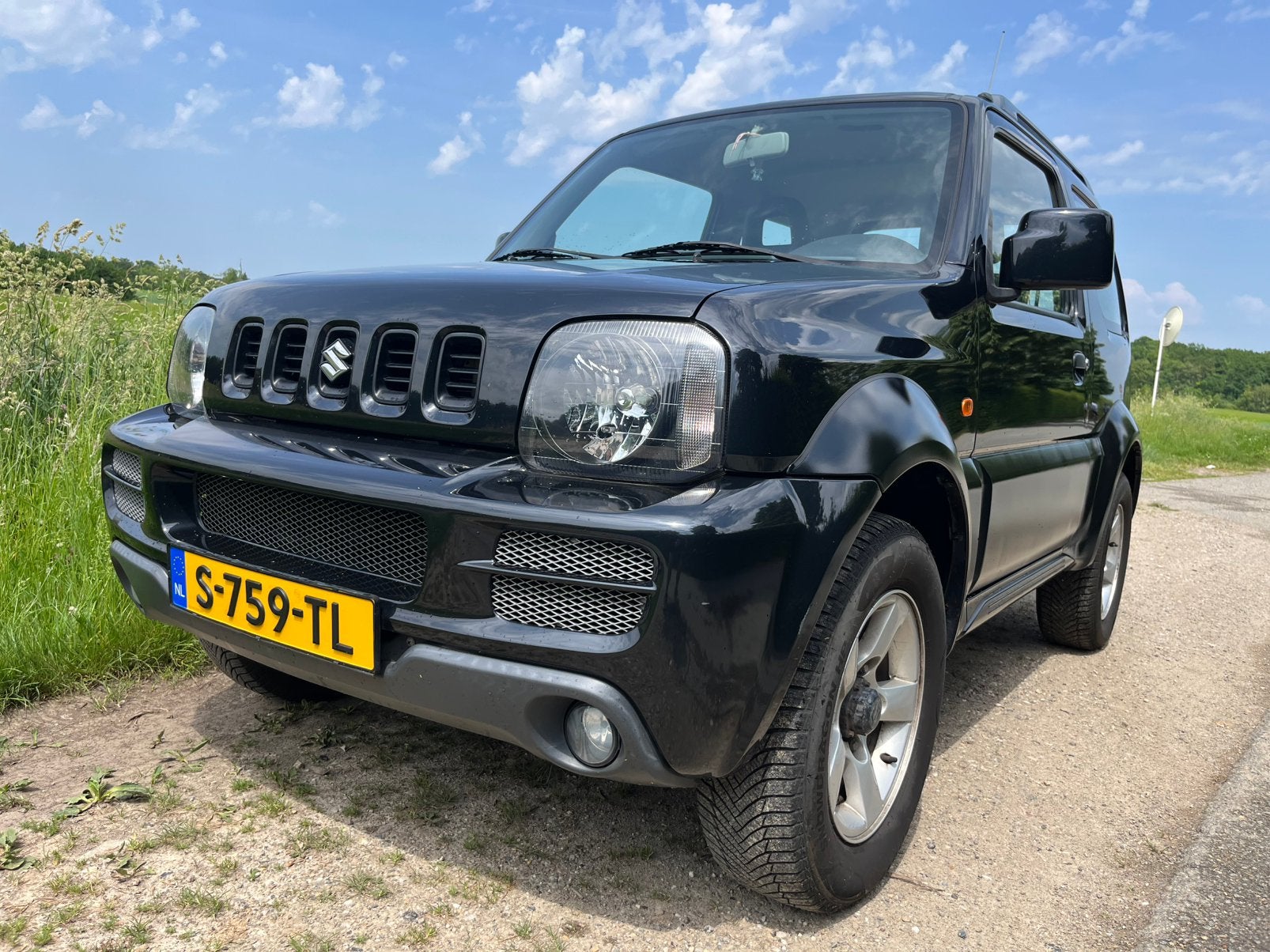 Suzuki Jimny 1.3 4WD 2008 Zwart, Auto's, 40 €/maand, 4 stoelen, Zwart, 14 km/l