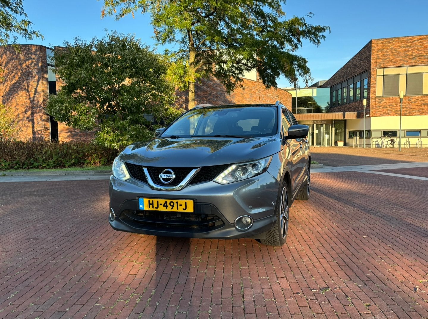 Nissan Qashqai 1.2 Tekna automaat 116PK 2015 | Pano| 360 NAP, Zwart, 4 cilinders, Leder en Stof, Origineel Nederlands