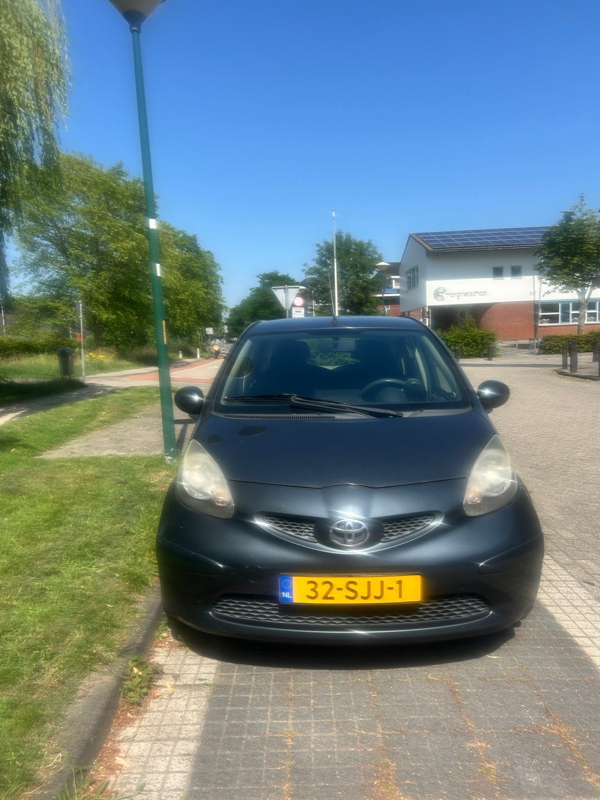 Toyota Aygo 1.0 12V Vvt-i 5DRS 2006 Grijs, Auto's, Voorwielaandrijving, 4 stoelen, 68 pk, Handgeschakeld