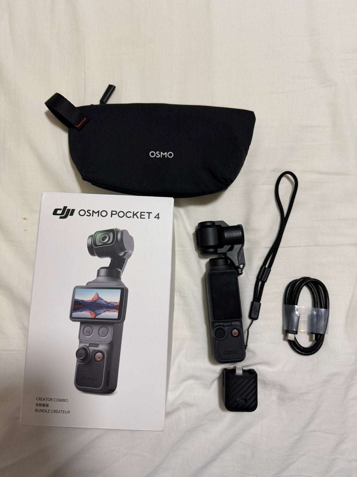DJI Osmo Pocket 4 Standard Combo, Ophalen of Verzenden, Zo goed als nieuw, Overige merken