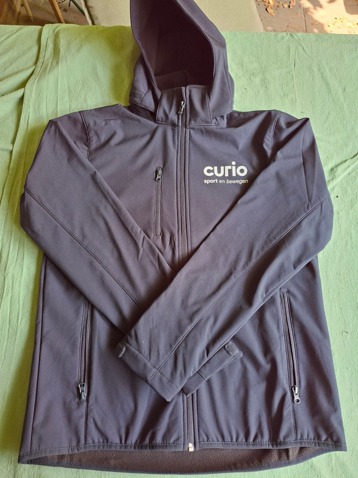 Softshel jas Curio Sport en Bewegen, maat L, Ophalen, Zo goed als nieuw, Blauw