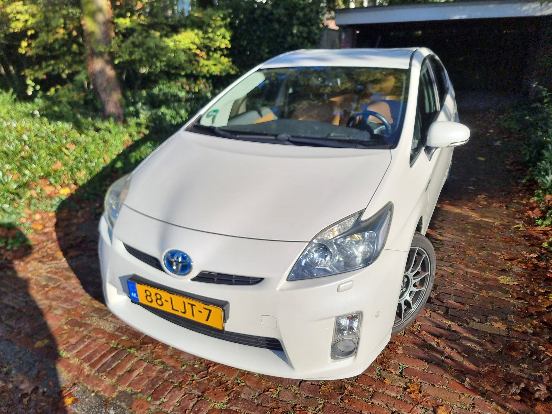 Toyota Prius HYBRID 1.8 Dynamic LED Xenon/Leer/Navi, Auto's, Gebruikt, 4 cilinders, Wit, Verwarmde buitenspiegels
