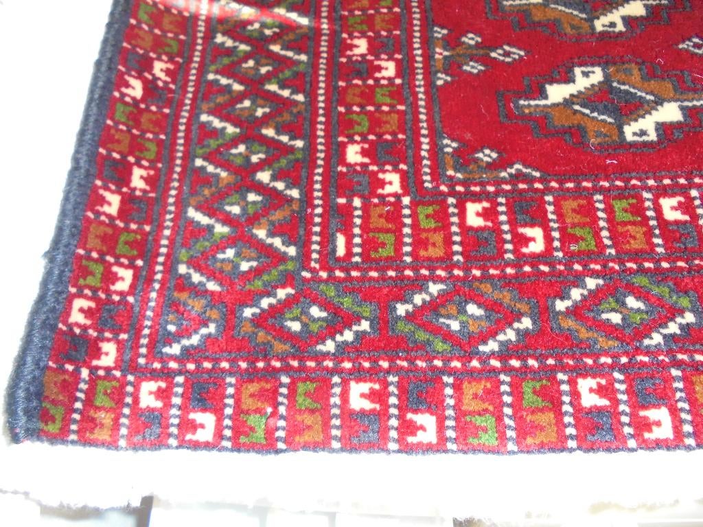 Wollen pers kleed tapijt afmeting 55 x 100 cm. Z.g.a.n., Ophalen