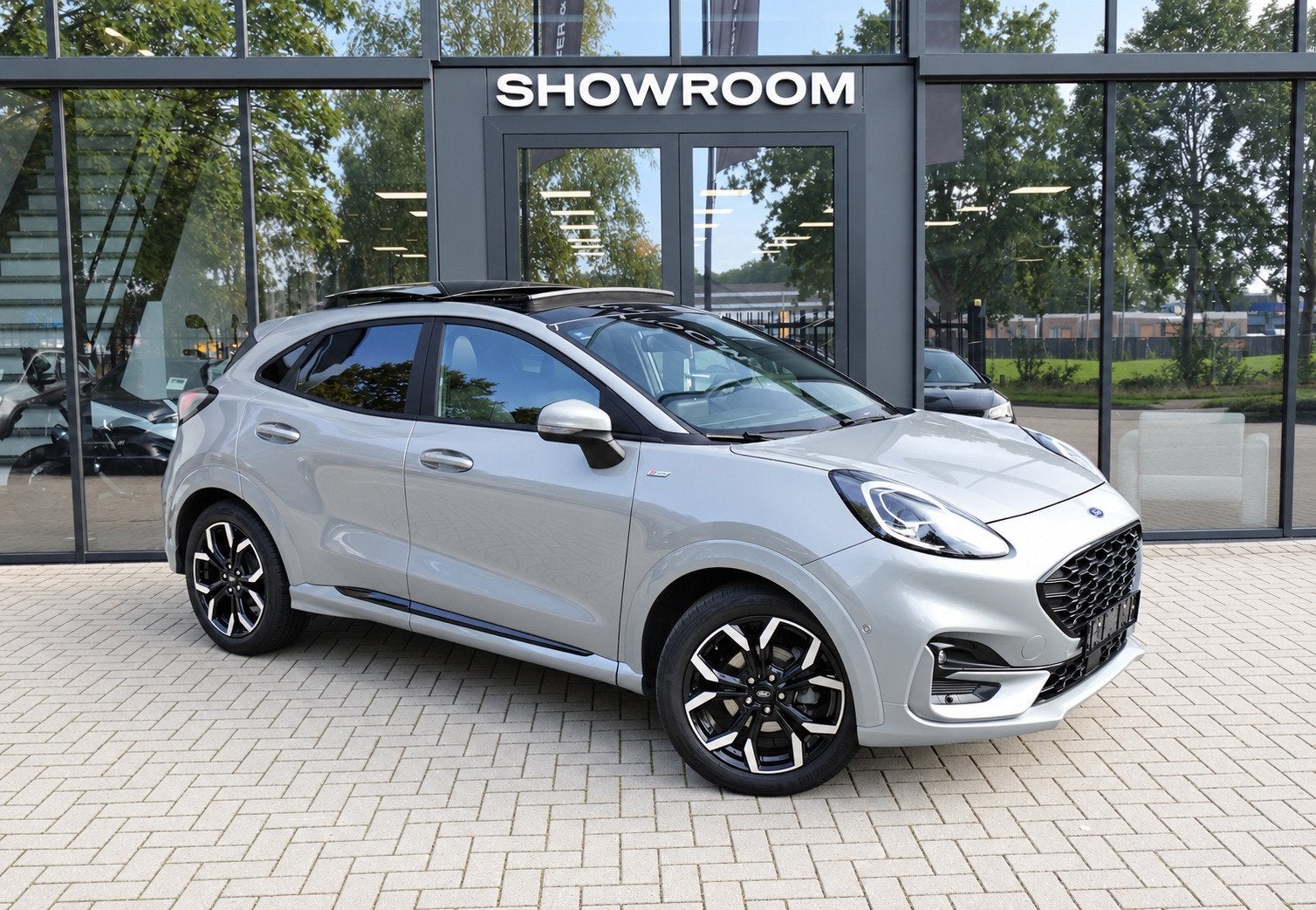 Ford Puma 1.0 EcoBoost Hybrid ST-Line X PANO B&O CAM, Auto's, Dealer onderhouden, Zwart, 1226 kg, Bedrijf