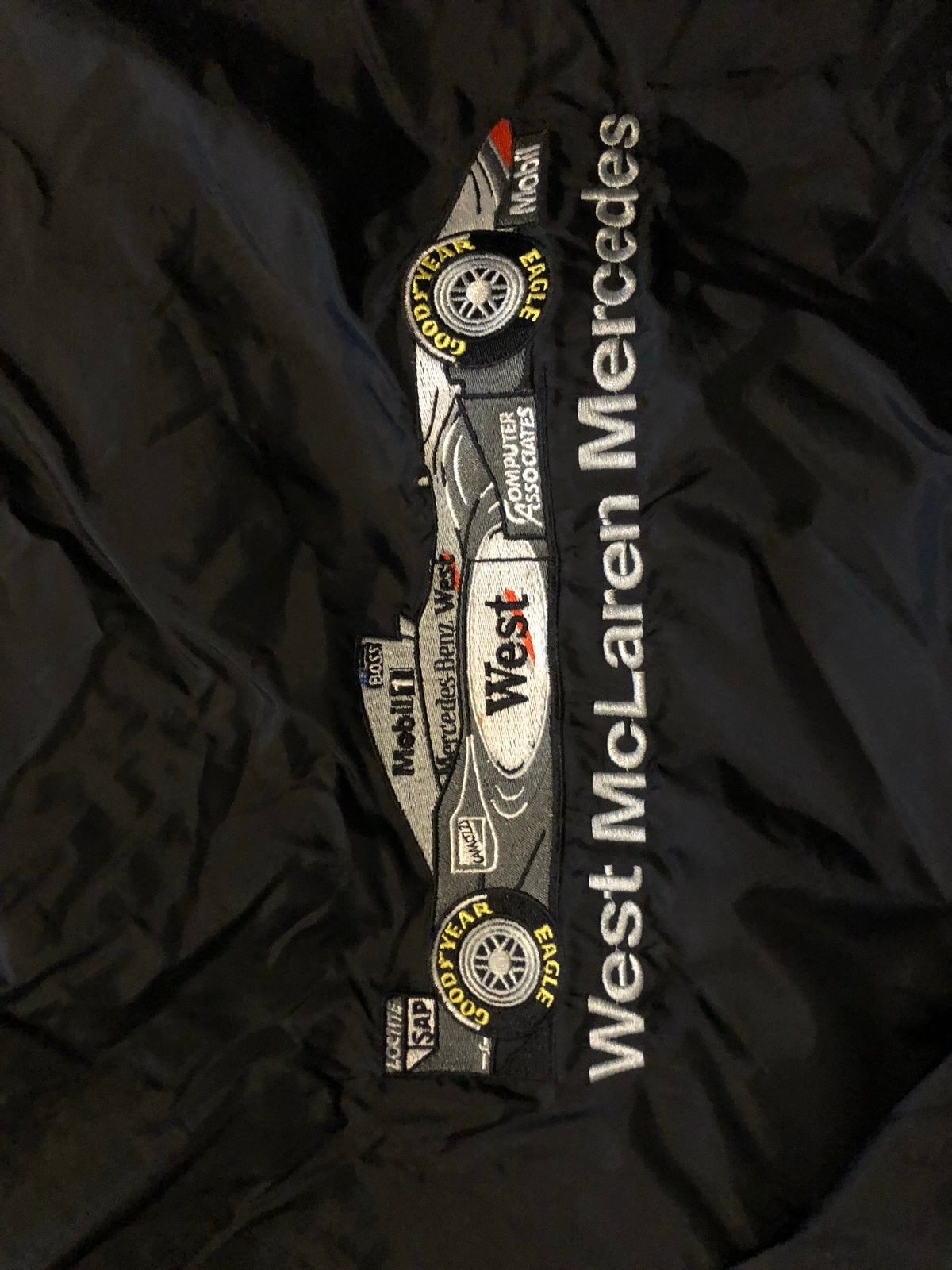 West McLaren Mercedes Racing Jas Zwart, Ophalen of Verzenden, Gedragen, Maat 52/54 (L), Zwart