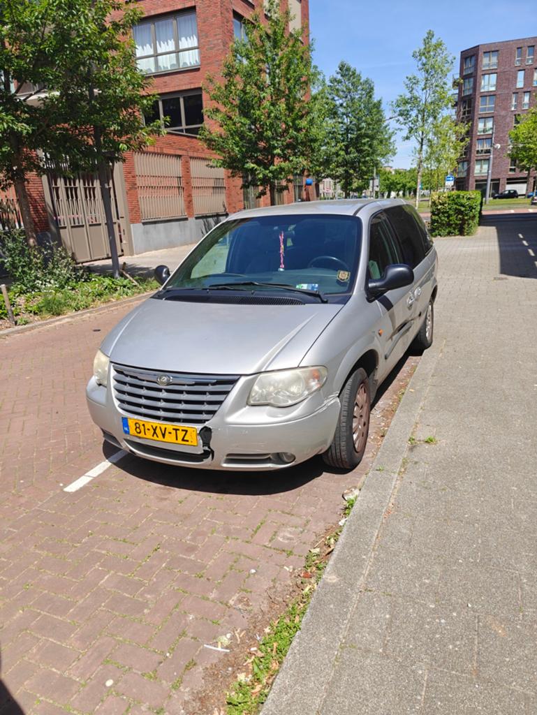 Chrysler Voyager 2.4 I 2007 Grijs, Auto's, Chrysler, Voorwielaandrijving, 450 kg, 4 cilinders, 7 stoelen