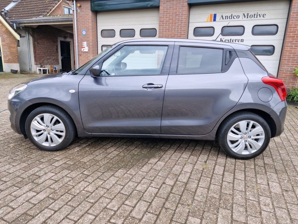 Suzuki Swift 1.0 Boosterjet (bj 2018), Auto's, Stof, Gebruikt, Euro 6, 840 kg