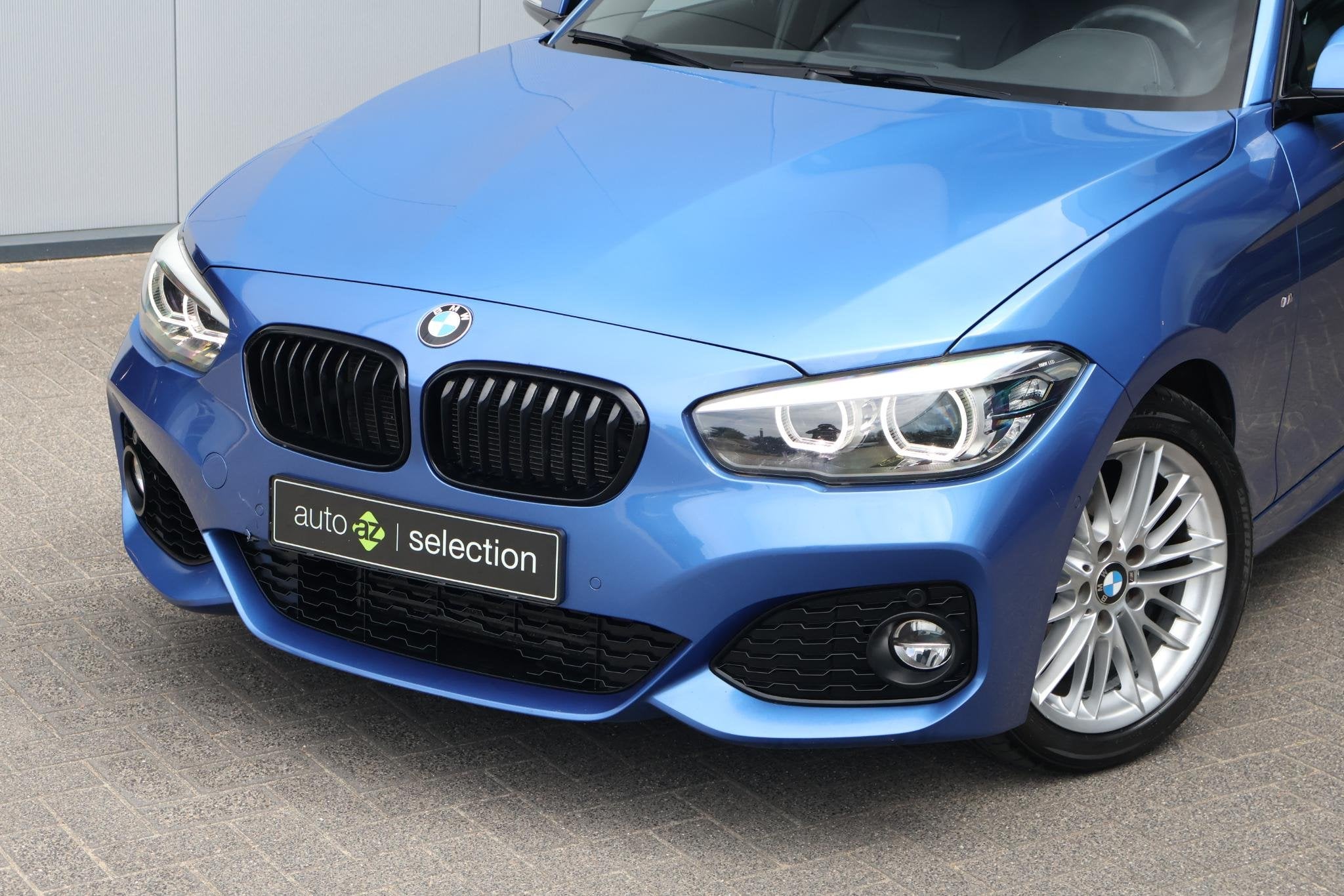 BMW 1-serie 118i Edition M Sport Shadow High Executive / DAB, Gebruikt, Blauw, Bedrijf, 650 kg