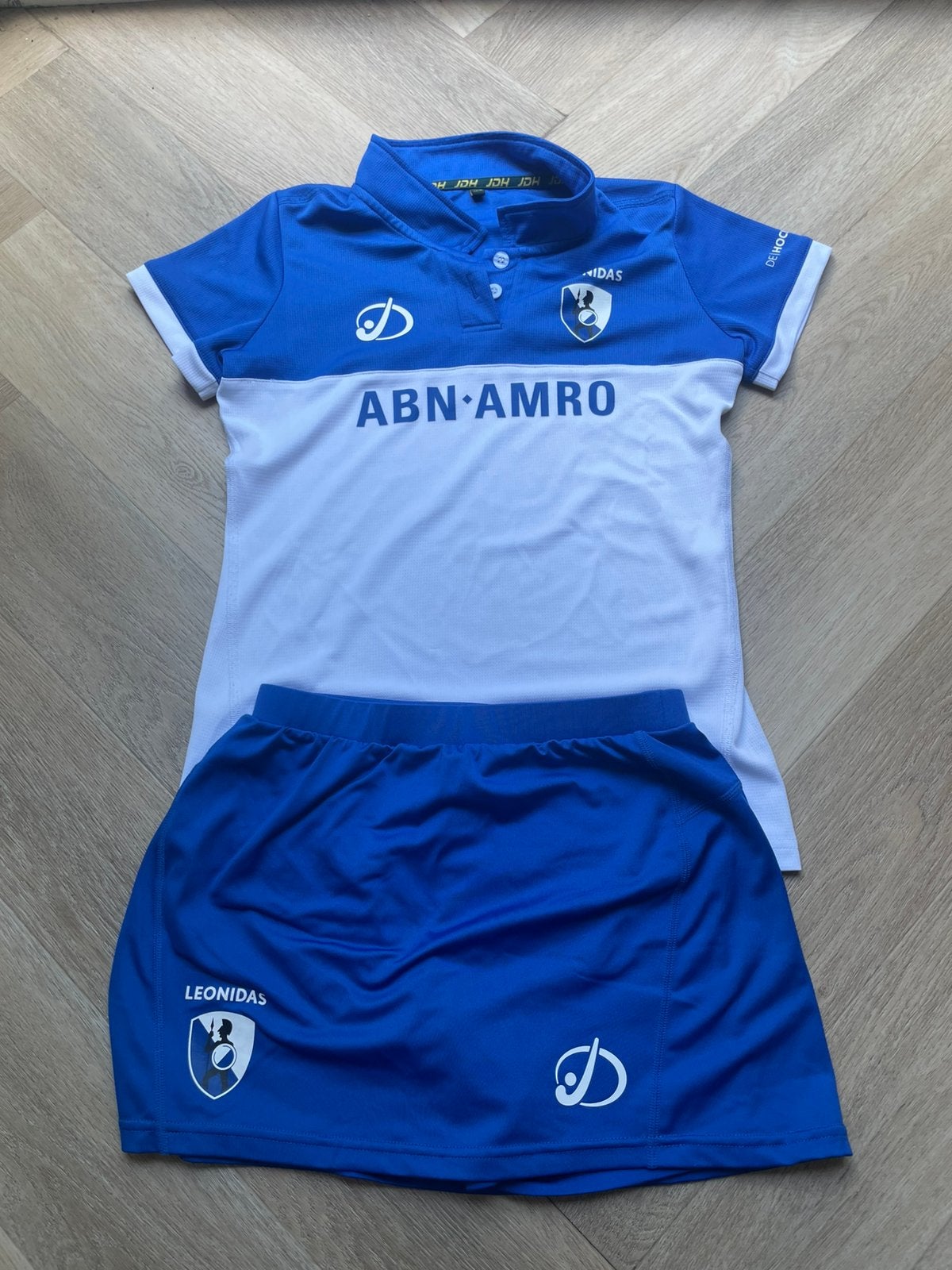 Leonidas hockey shirt + rokje meisjes – maat 164, Ophalen, Zo goed als nieuw, Kleding