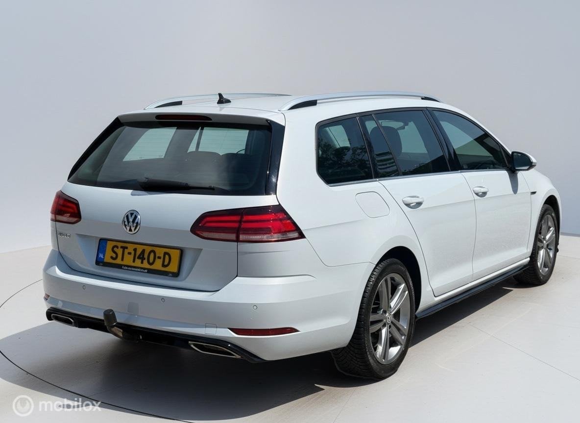 Volkswagen Golf Variant 1.0 TSI Highline Business R LED|DSG|, Auto's, Gebruikt, Wit, Origineel Nederlands, 650 kg