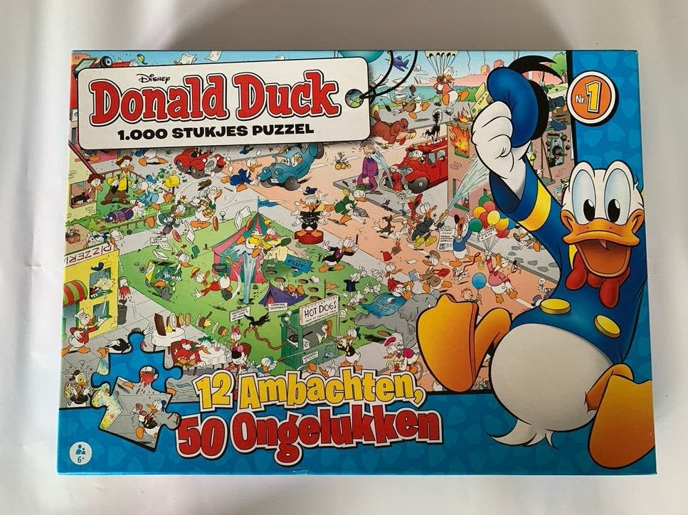 Donald Duck Puzzel - 1000 stukjes - 12 Ambachten, 50 Ongeluk, Ophalen of Verzenden, Meer dan 50 stukjes, Zo goed als nieuw, 6 jaar of ouder