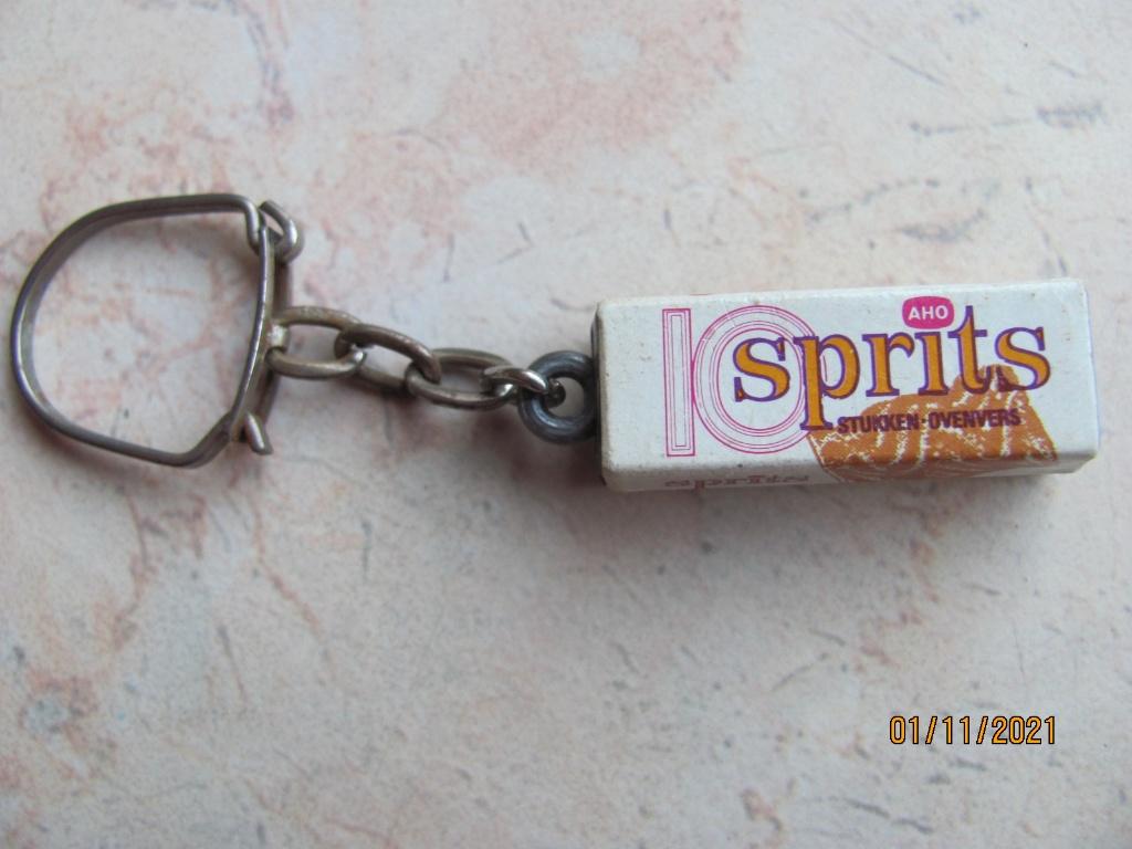 VINTAGE reclame AHO koek Sprits SLEUTELHANGER 60 70 IZGS, Verzamelen, Sleutelhangers, Ophalen of Verzenden, Gebruikt, Merk