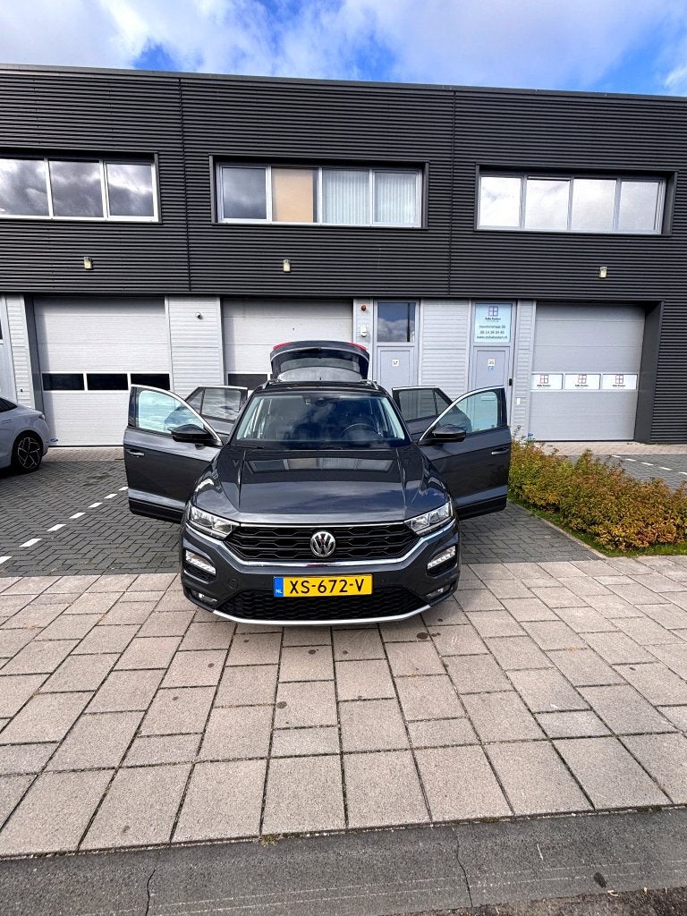 Volkswagen T-Roc 1.5 TSI Sport DSG Automaat | 1e eigenaar, Auto's, Dealer onderhouden, Stof, 1498 cc, 4 cilinders