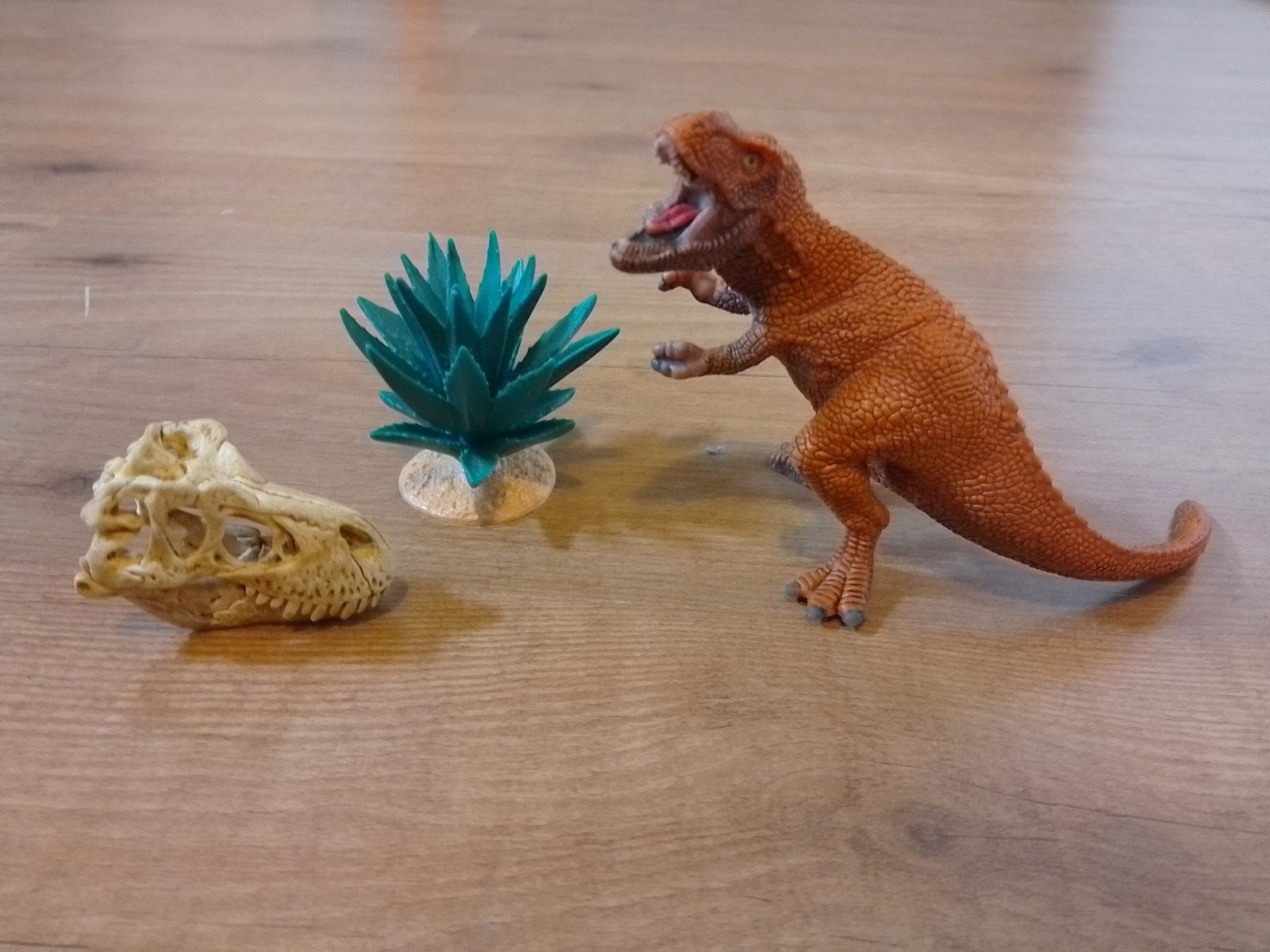 Schleich dinosaurus met schedel en plant, Ophalen of Verzenden, Zo goed als nieuw, Overige soorten, Beeldje of Figuurtje
