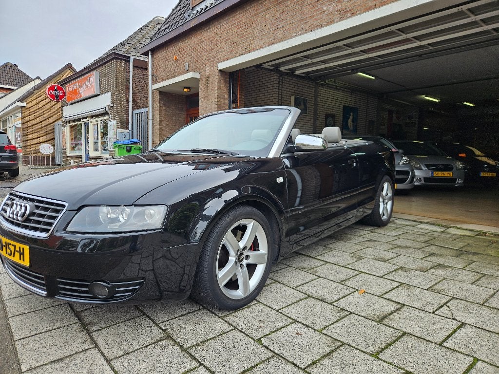 Audi A4 3.0 V6 Cabriolet 2002 Zwart, Auto's, Audi, Beige, 1595 kg, Cabriolet, 4 stoelen