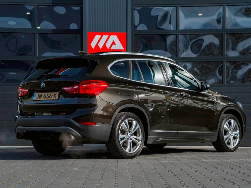 BMW X1 XDrive20i Centennial High Executive, Auto's, 1998 cc, Automatische klimaatregeling, Gebruikt, Bedrijf