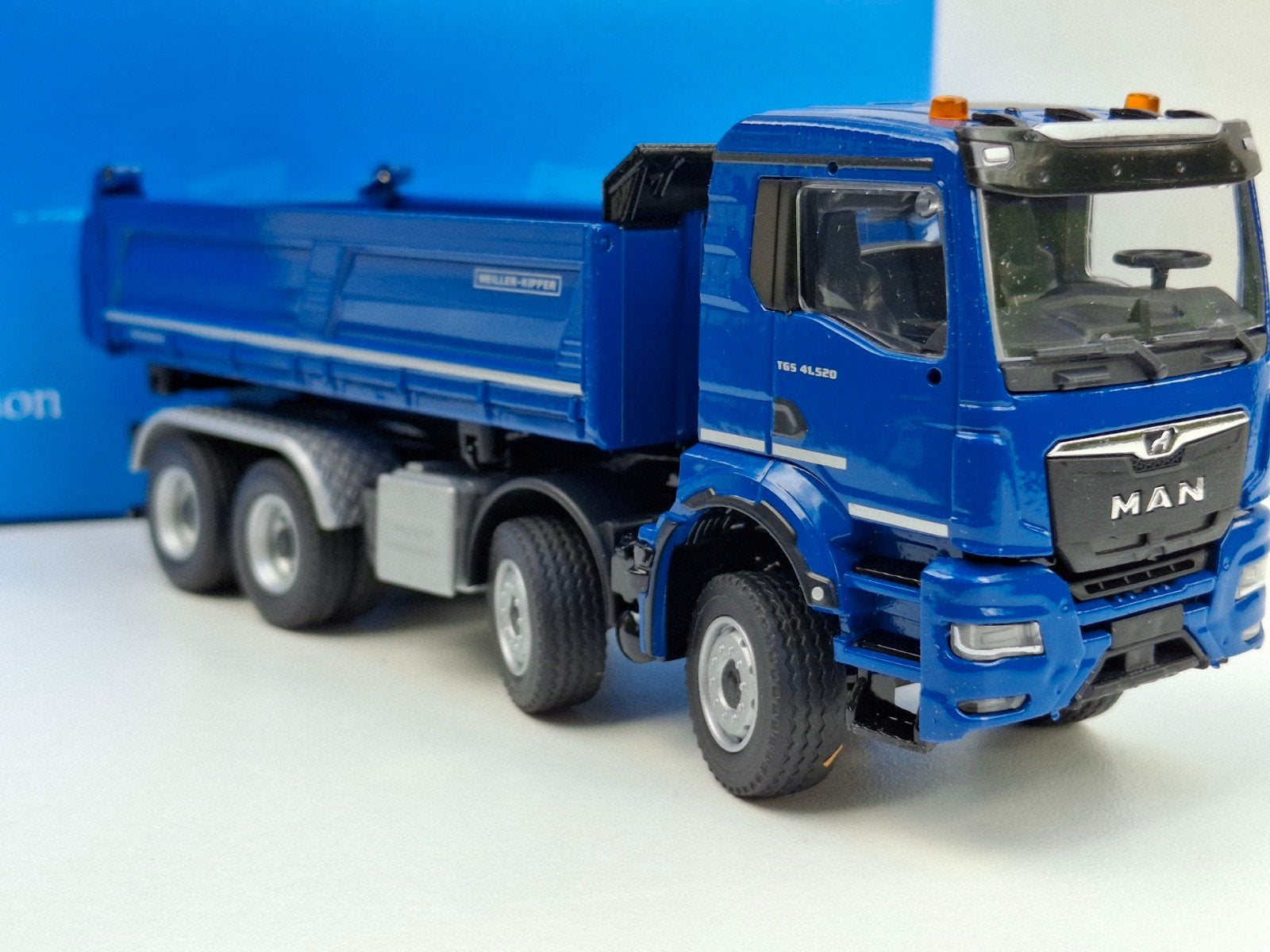 MAN TGS MEILLER TRIGENIUS KIPPER 1:50, Ophalen of Verzenden, Nieuw, Bus of Vrachtwagen, Conrad
