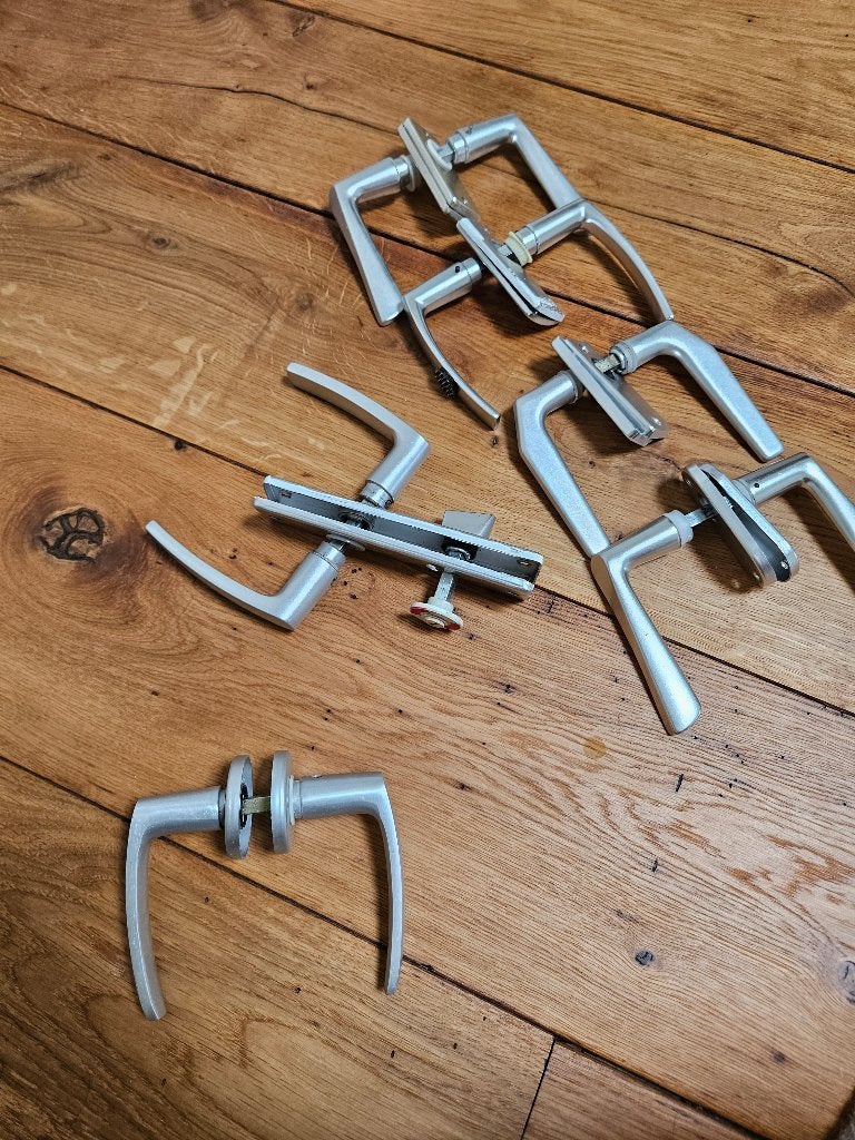 Verschillende deurkrukken zilverkleurig, Ophalen of Verzenden, Gebruikt, Rvs, Klink of Kruk