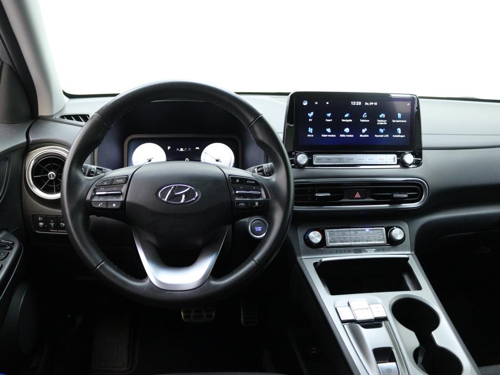 Hyundai KONA EV Fashion 64 kWh | Navigatie | Achteruitrijcam, Auto's, Hyundai, 12 maanden, Gebruikt, Zwart, Automatische klimaatregeling