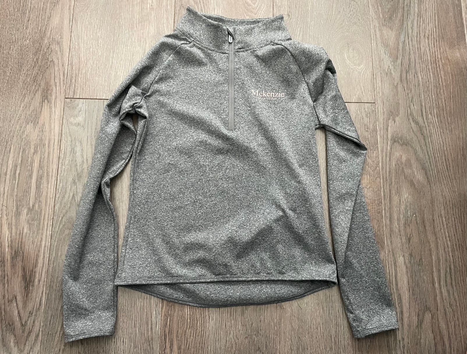 Sport longshirt meisje Mckenzie mt 128, Kinderen en Baby's, Ophalen of Verzenden, Zo goed als nieuw, Meisje, Sport- of Zwemkleding