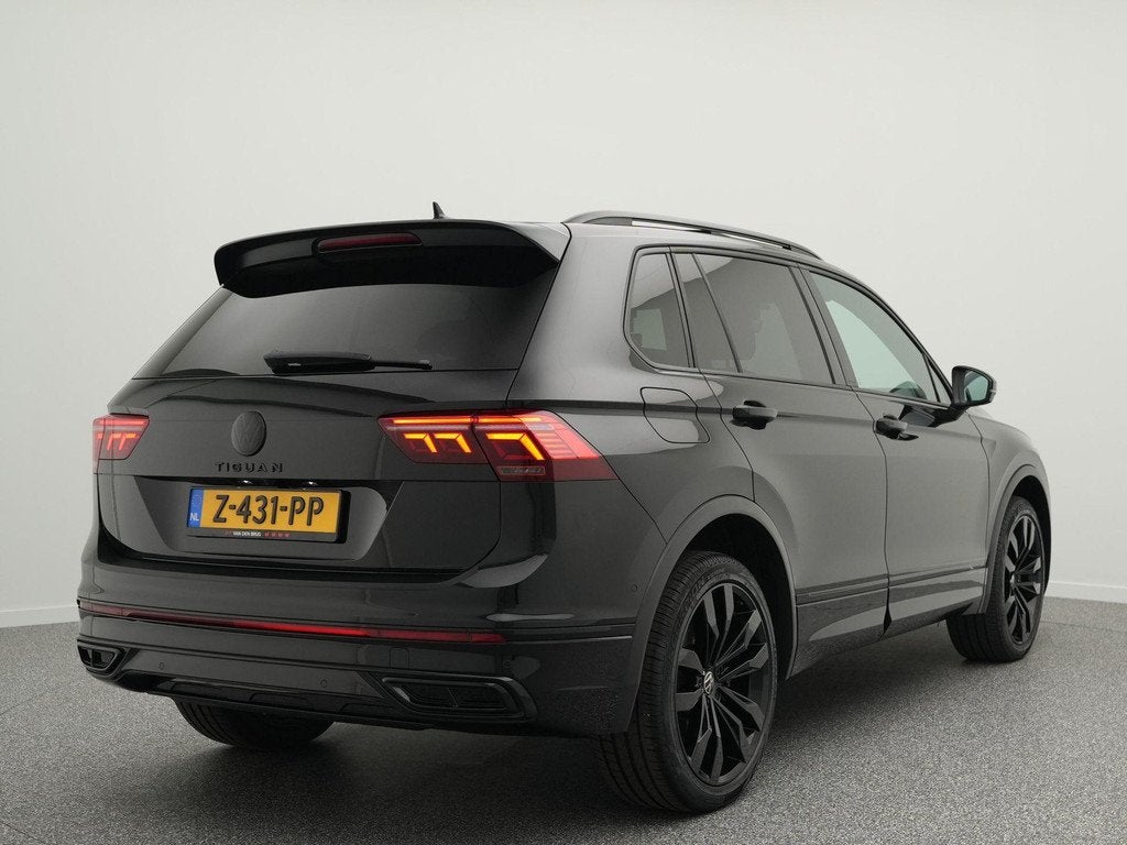 Volkswagen Tiguan R-Line 1.4 TSI 245 PK eHybrid Business+ |, Auto's, Stof, Euro 6, Automatische klimaatregeling, Zwart