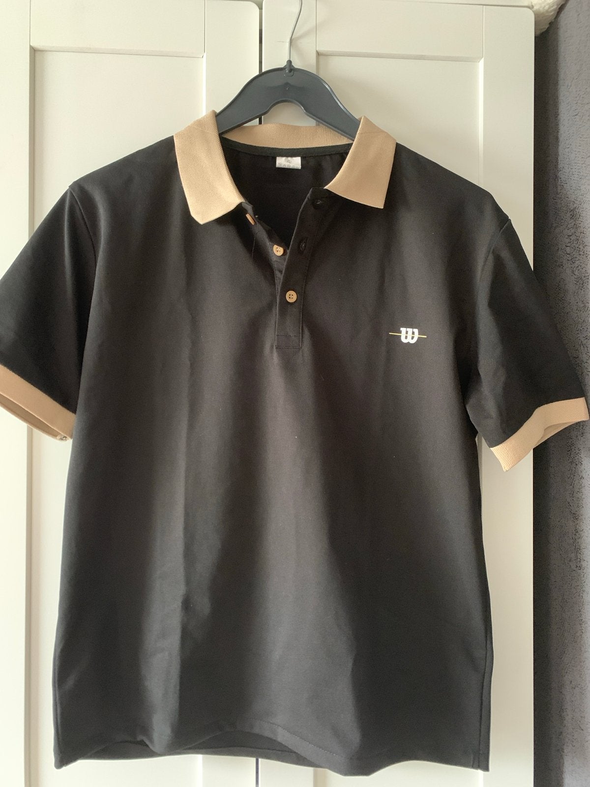 Zwart Wilson poloshirt met beige kraag en mouwboorden, Ophalen of Verzenden, Zo goed als nieuw, Maat 46 (S) of kleiner, Zwart