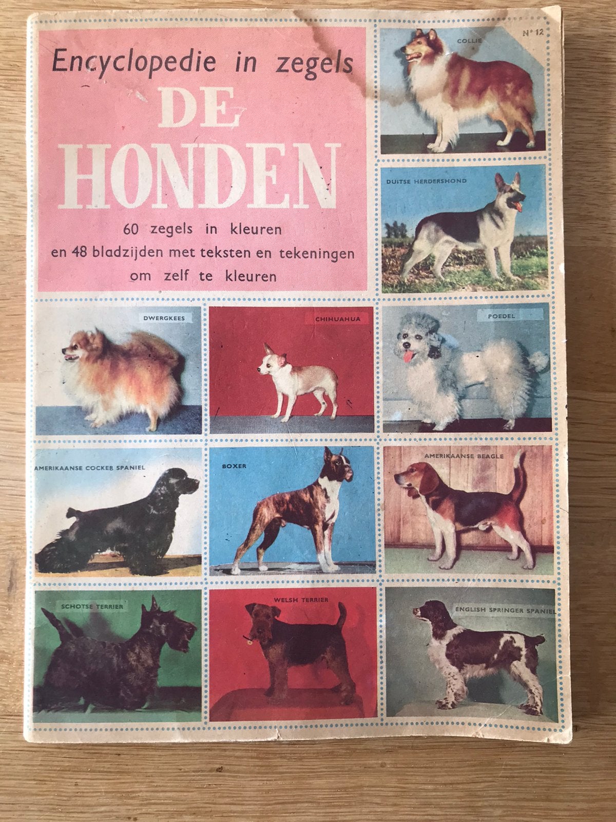 Plaatjesalbum De honden (encyclopedie in zegels), Ophalen of Verzenden, Gelezen