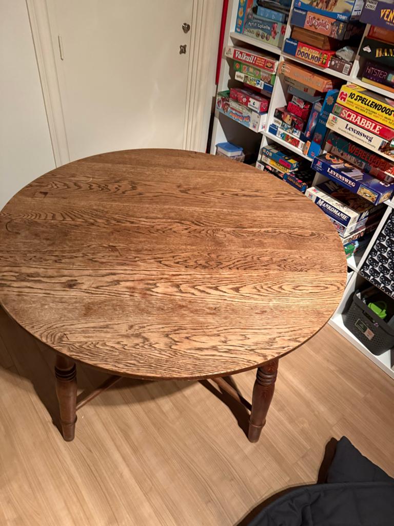 Uitschuifbare ronde eettafel van eikenhout, Huis en Inrichting, Gebruikt, 100 tot 150 cm, Ophalen of Verzenden, Vier personen
