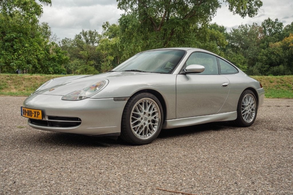 Porsche 911 3.4 Carrera Coupe AUT 2000 Grijs, Auto's, Automaat, Dealer onderhouden, Achterwielaandrijving, Xenon verlichting
