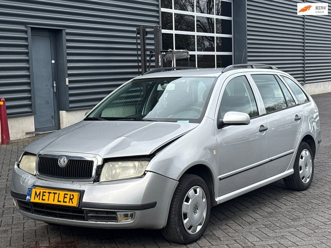Skoda Fabia Combi 1.4-16V Comfort automaat, Auto's, 450 kg, Gebruikt, 4 cilinders, Startonderbreker