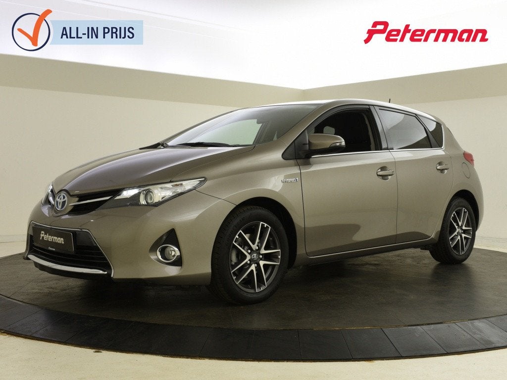 Toyota Auris 1.8 Hybrid Comfort | Navigatie | Trekhaak | Cli, Auto's, 136 pk, Gebruikt, 4 cilinders, Beige