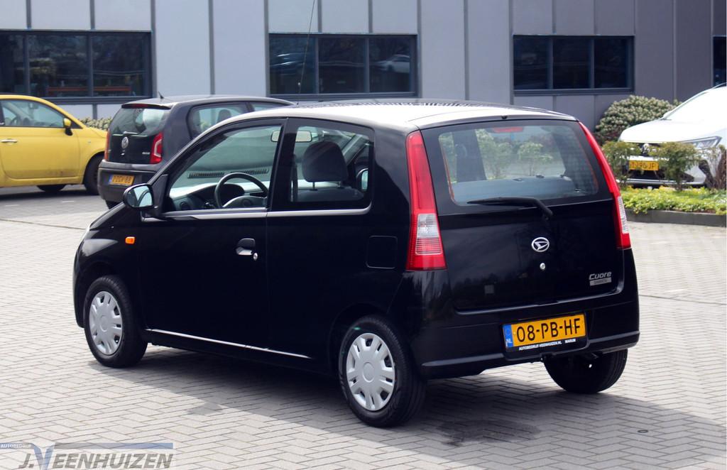 Daihatsu Cuore 1.0-12V Tokyo | Nieuwe APK | Zuinig, Auto's, Stof, 18 €/maand, Zwart, Origineel Nederlands