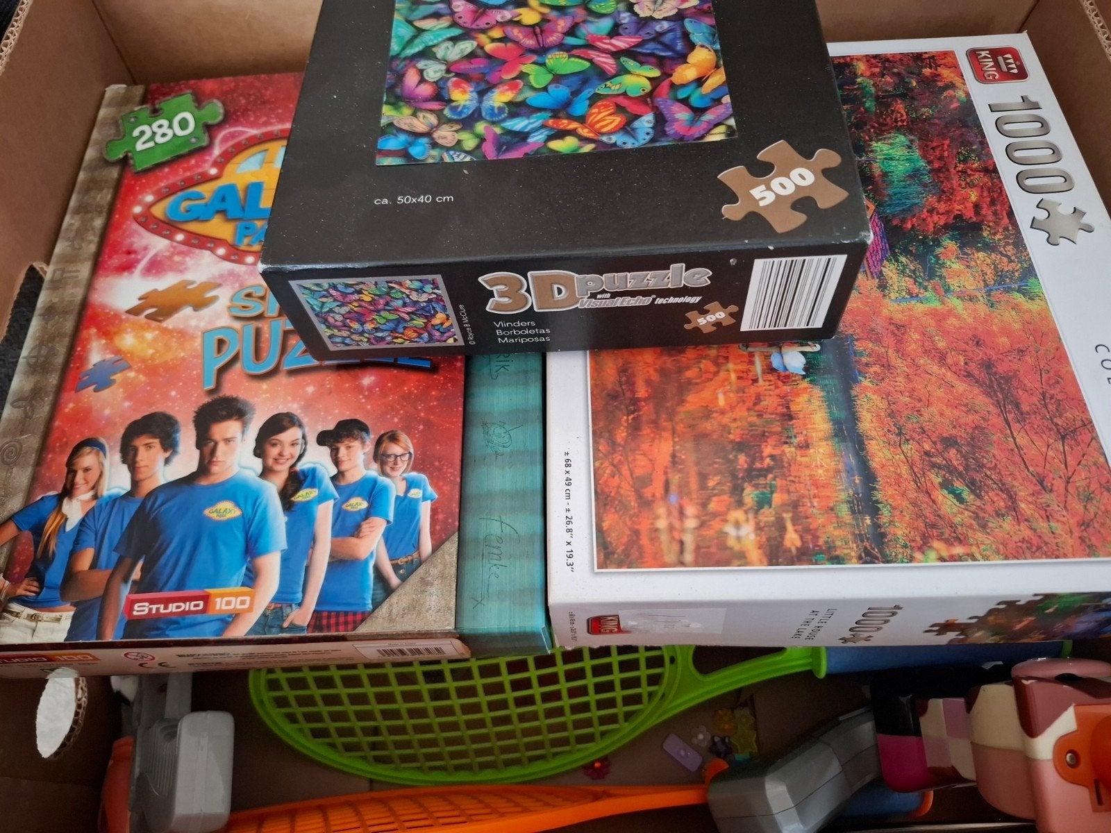 Gratis doos met 5 puzzels en speelgoed, Ophalen