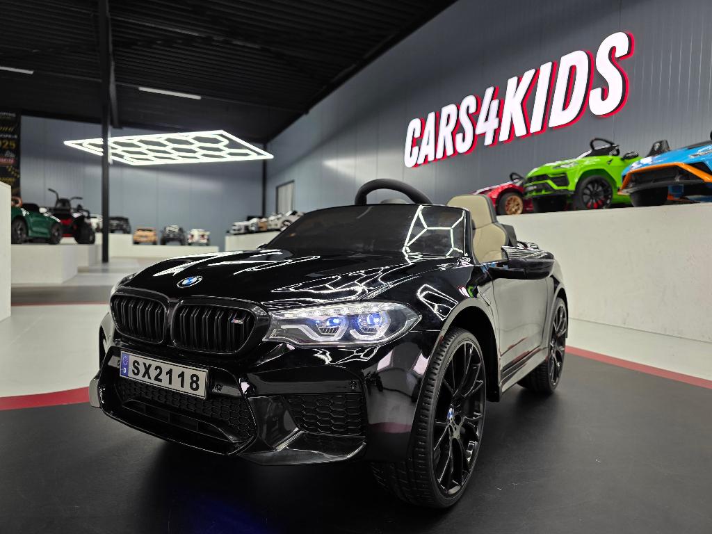Kinderauto BMW M5 - 24 volt - verstelbare zitting - met RC