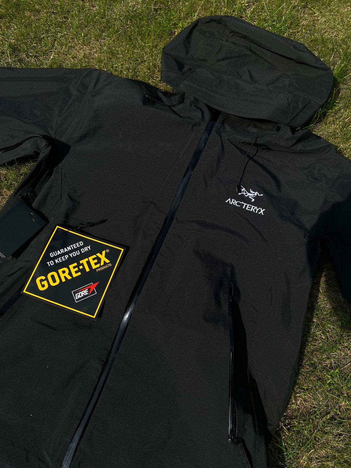 Arcteryx regenjas zwart, Ophalen of Verzenden, Zo goed als nieuw, Maat 52/54 (L), Zwart