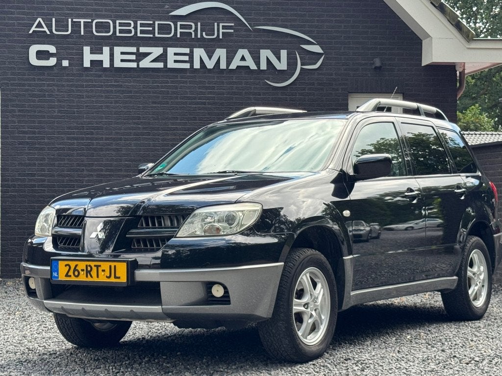 Mitsubishi Outlander 2.0 Invite plus Goed Onderhouden Airco, Auto's, Mitsubishi, Voorwielaandrijving, 136 pk, Zwart, 4 cilinders